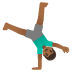 man cartwheeling, medium-dark skin tone